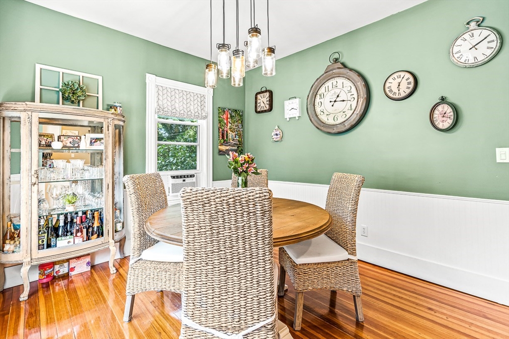 69 Maple Street Middleton, MA 01949 - Photo 15 of 33 a view of a dining area with furniture and a large window