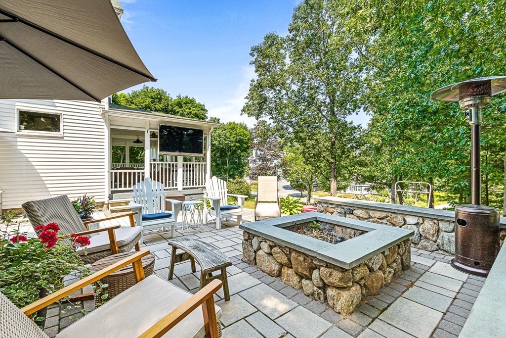 69 Maple Street Middleton, MA 01949 - Photo 27 of 33 a view of a backyard with sitting area