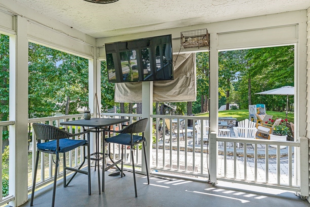 69 Maple Street Middleton, MA 01949 - Photo 31 of 33 a view of a chairs and table in patio