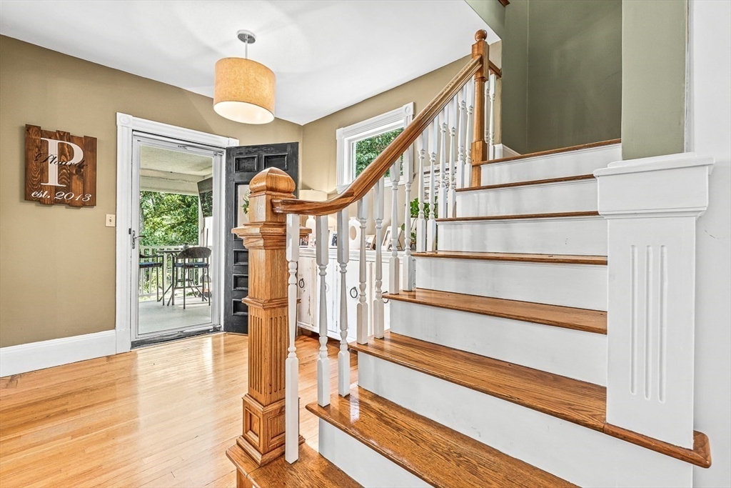 69 Maple Street Middleton, MA 01949 - Photo 6 of 33 a view of entryway with wooden floor and door