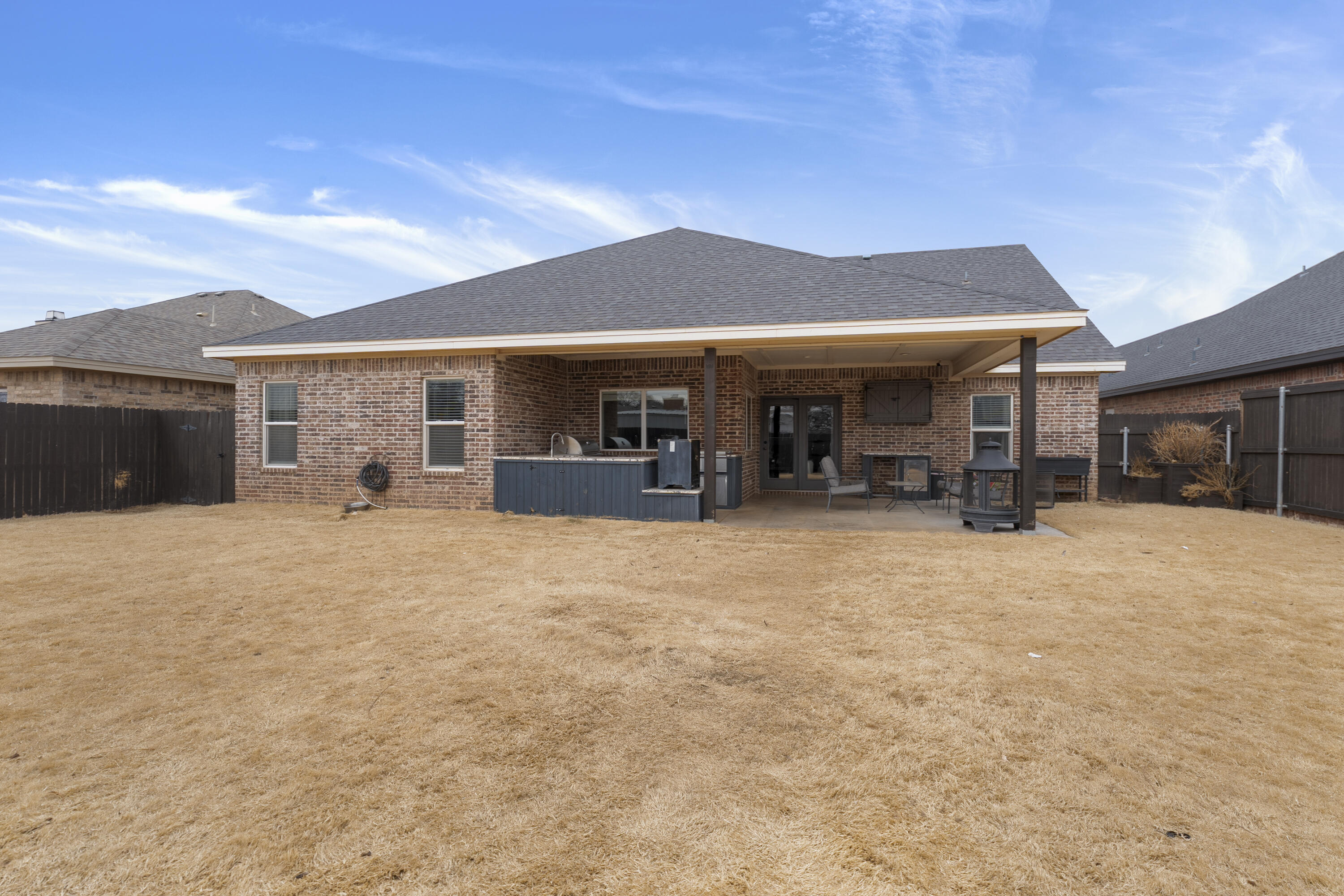1122 16th Street Shallowater, TX 79363 - Photo 30 of 32 a house view with a seating space and a garden
