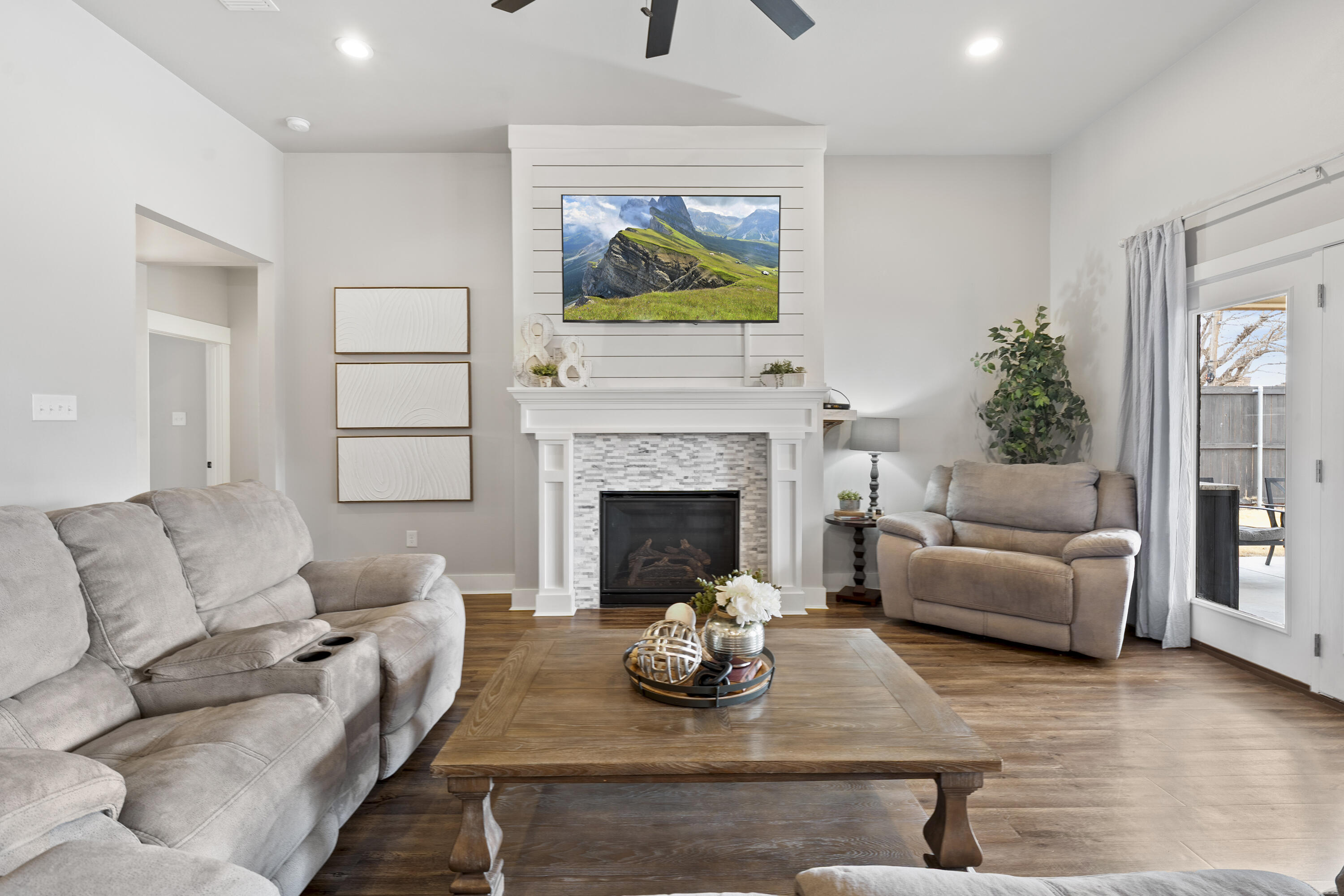1122 16th Street Shallowater, TX 79363 - Photo 6 of 32 a living room with furniture fireplace and window