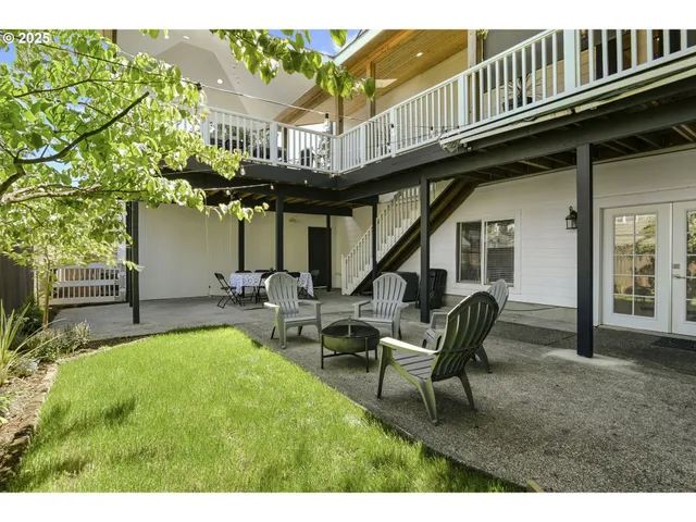 a view of a chairs and table in the patio