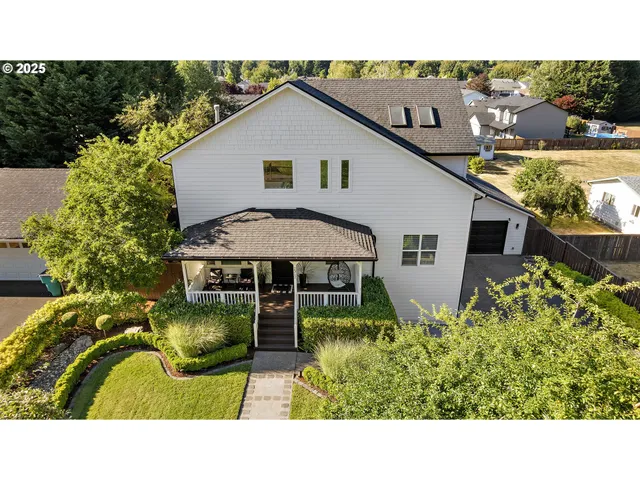 a upper view of a house with backyard