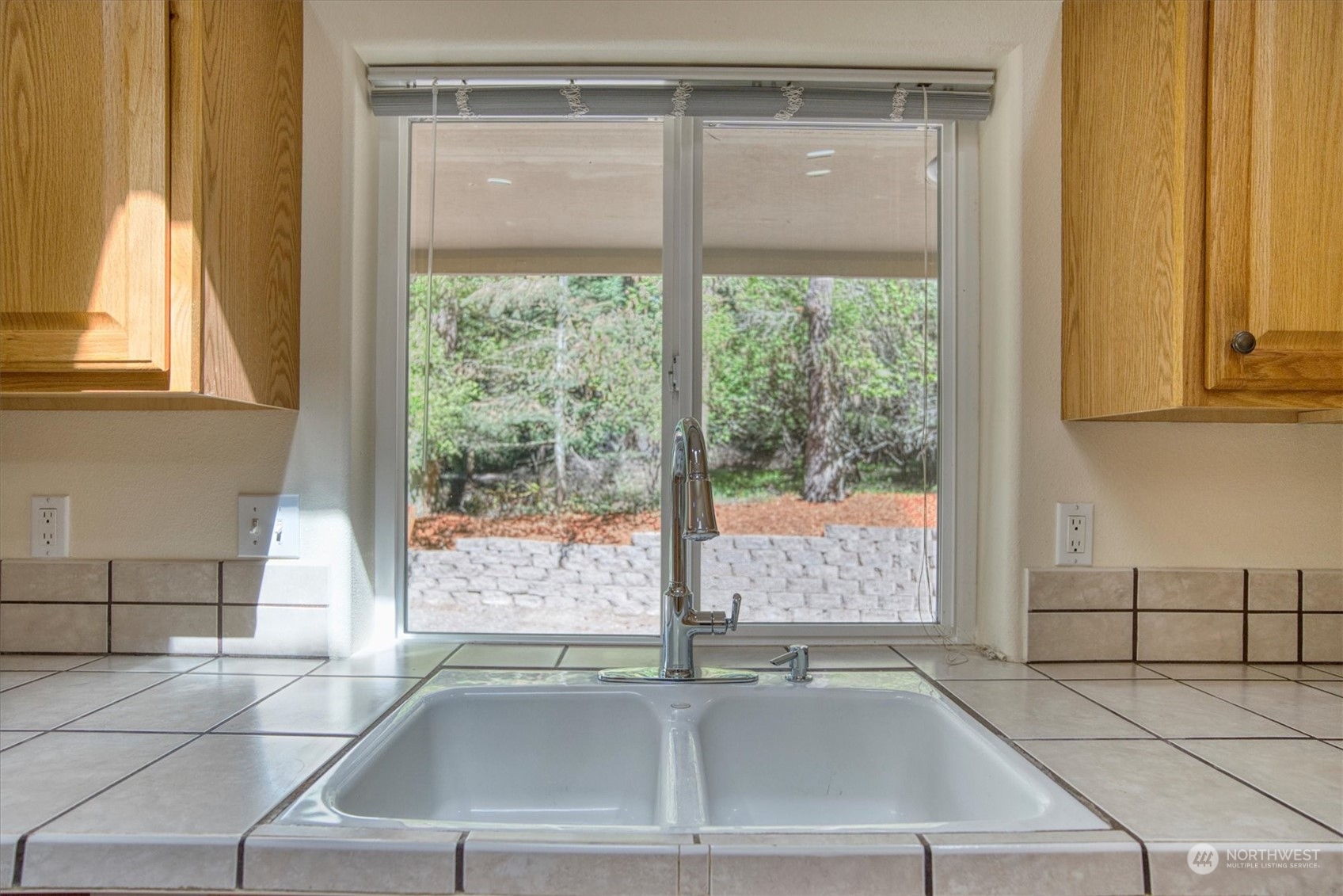 581 Ridge View Drive Sequim, WA 98382 - Photo 12 of 40 a view of a sink and window