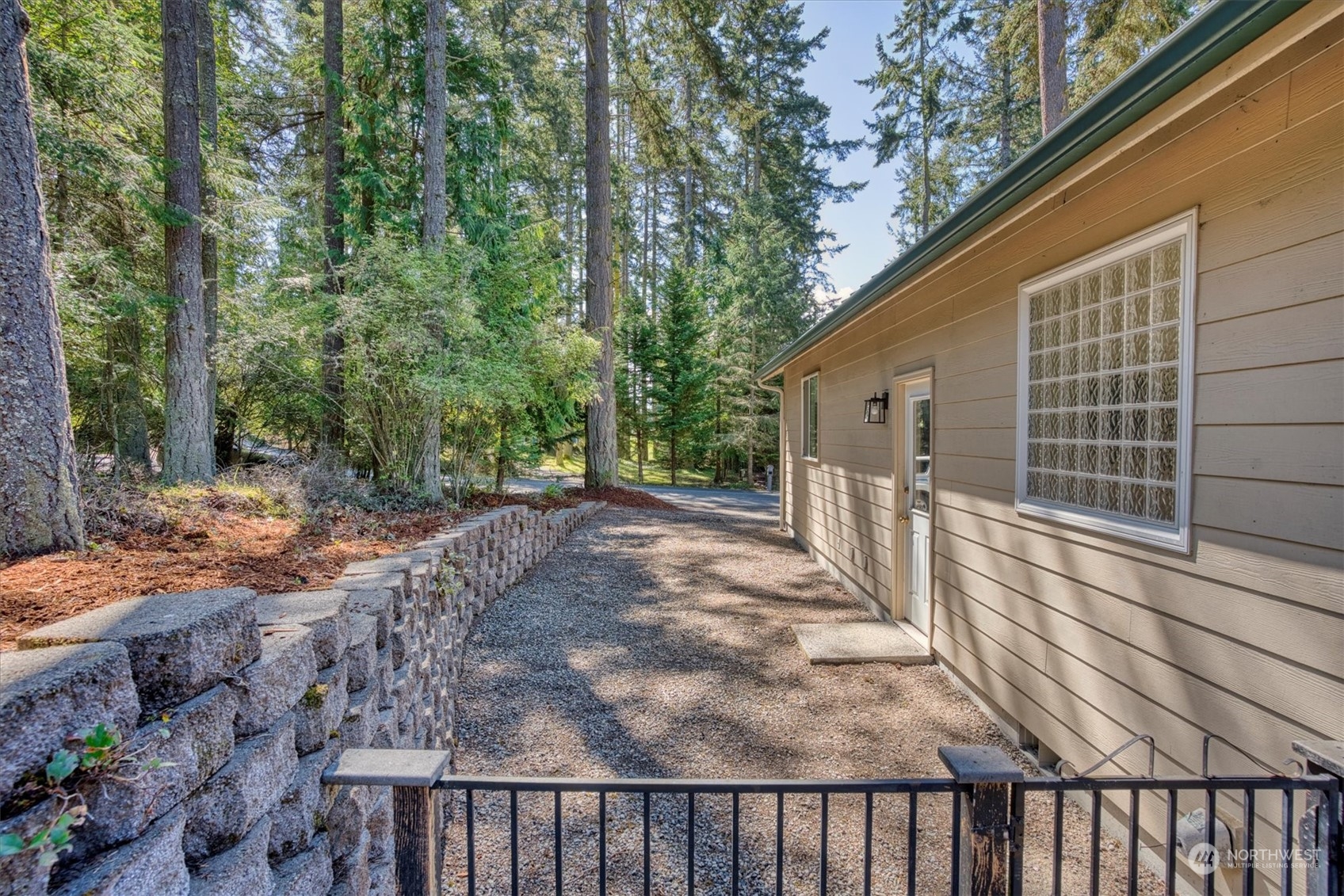581 Ridge View Drive Sequim, WA 98382 - Photo 35 of 40 a view of a backyard with pathway