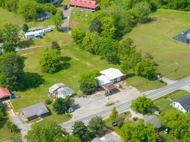 an aerial view of residential house with outdoor space