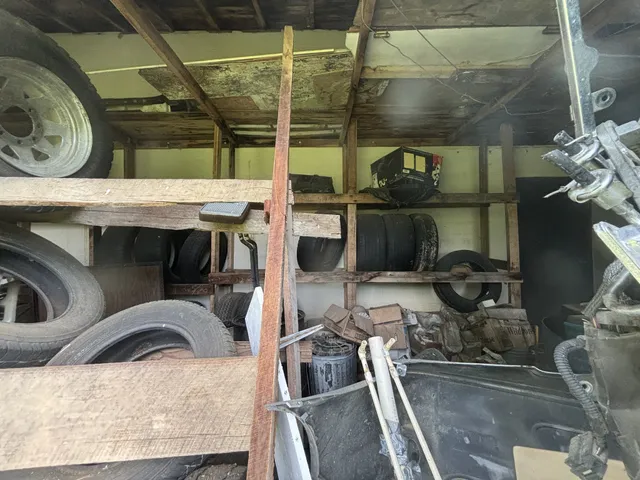 a room with gym equipment and a flat screen tv