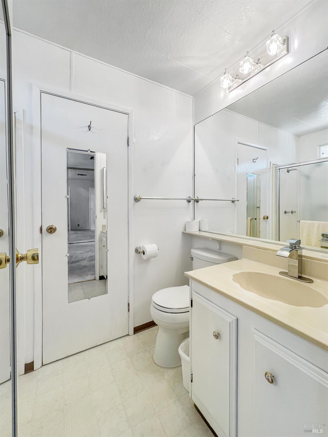 85 Estrella Drive Santa Rosa, CA 95403 - Photo 14 of 27 a bathroom with a sink a toilet and shower
