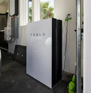an aerial view of a house with a swimming pool