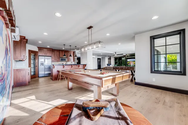 a living room with furniture and a table