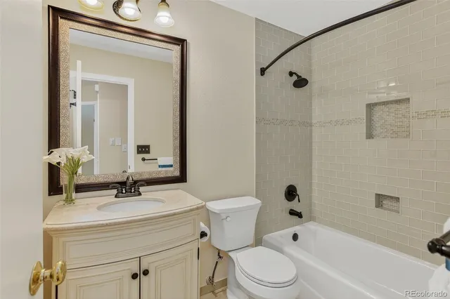 a view of a hallway with washer and dryer