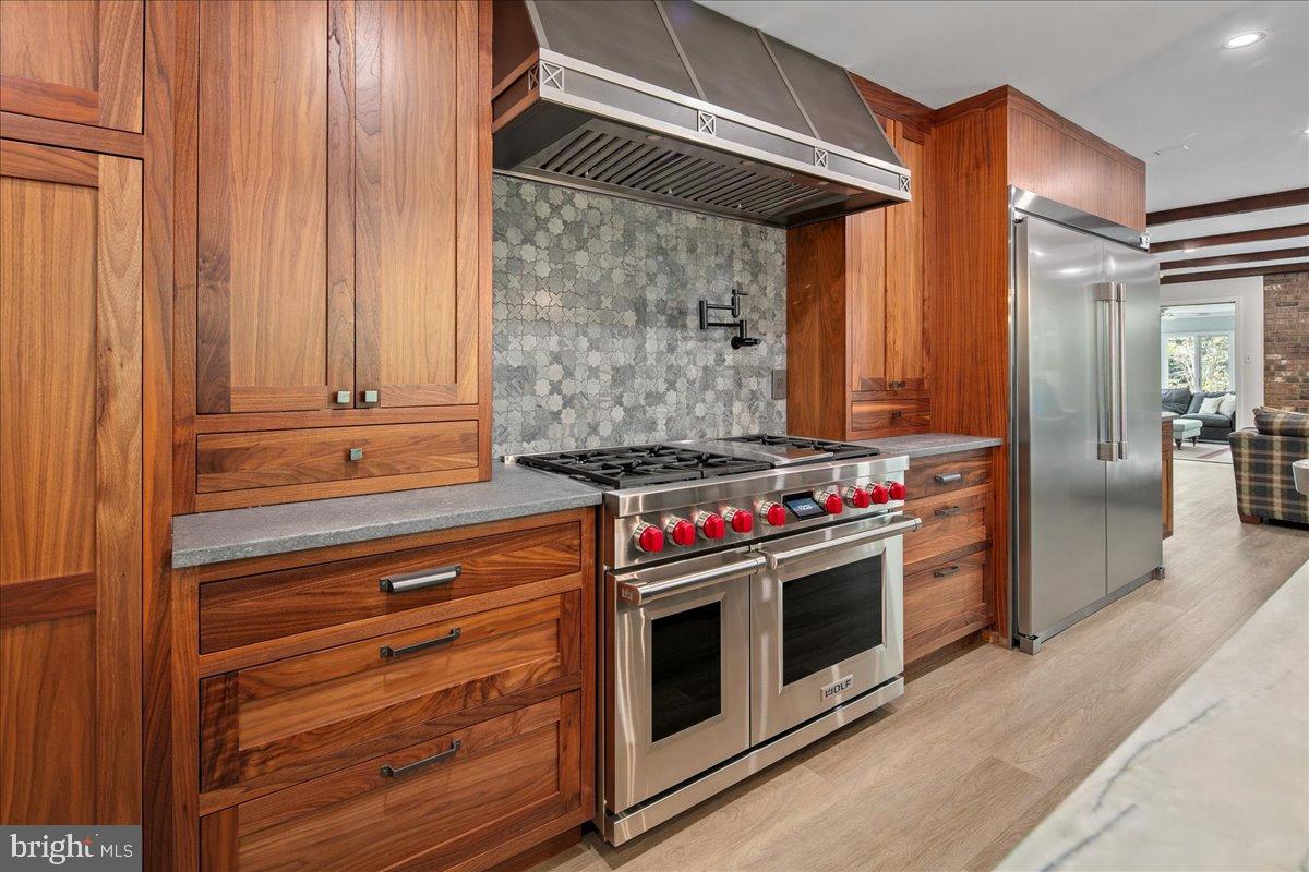 12421 Henderson Road Clifton, VA 20124 - Photo 3 of 90 Gorgeous Walnut Cabinets & Wolf Range & Hood