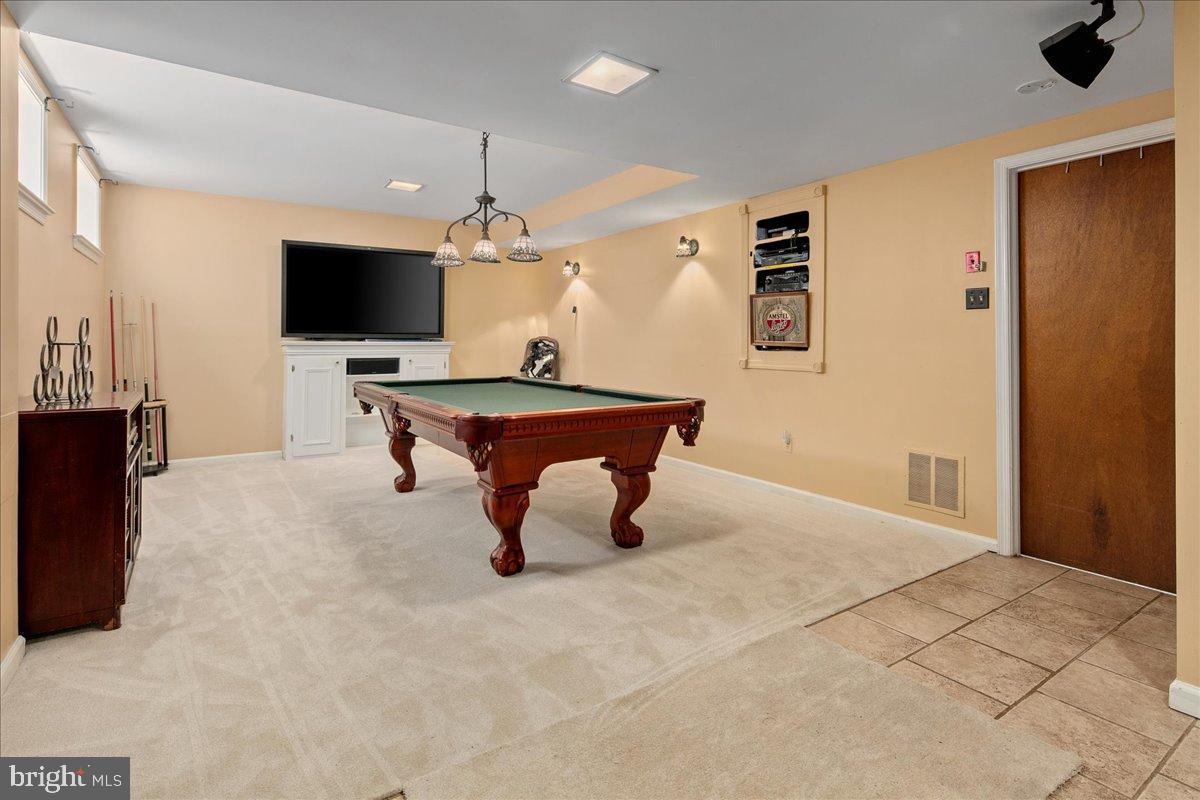 12421 Henderson Road Clifton, VA 20124 - Photo 52 of 90 Spacious Rec Room with elegant pool table.