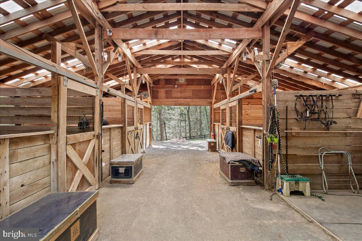 12421 Henderson Road Clifton, VA 20124 - Photo 68 of 90 Bright & Airy Center Aisle Barn