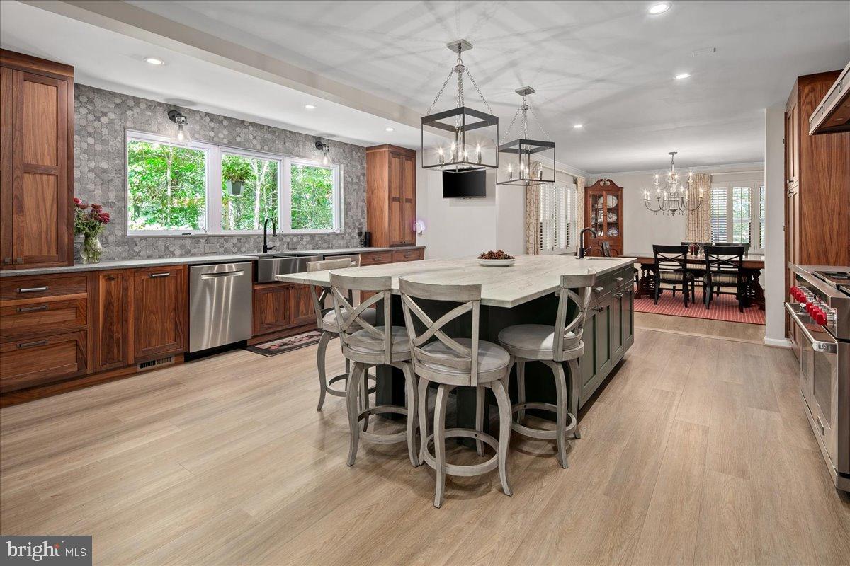 12421 Henderson Road Clifton, VA 20124 - Photo 8 of 90 Modern kitchen with elegant wood accents.