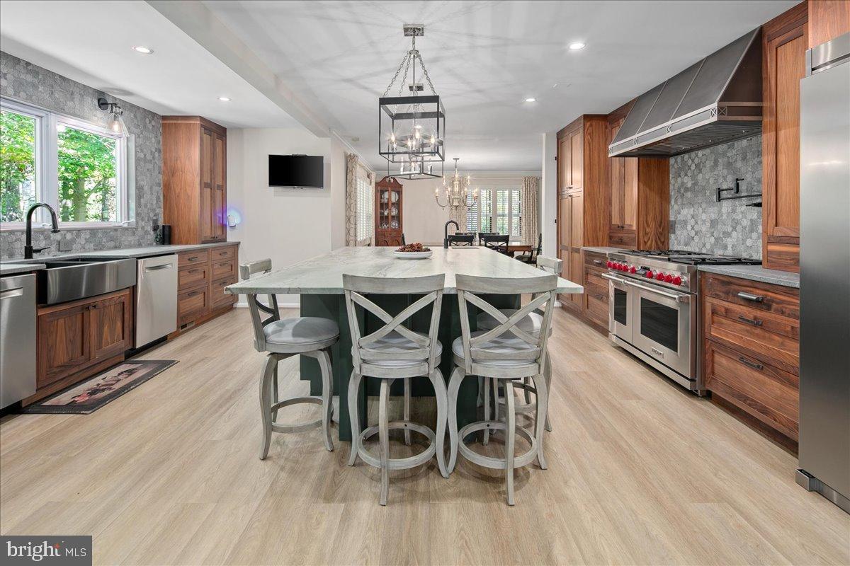 12421 Henderson Road Clifton, VA 20124 - Photo 9 of 90 Gourmet kitchen with elegant wood accents.