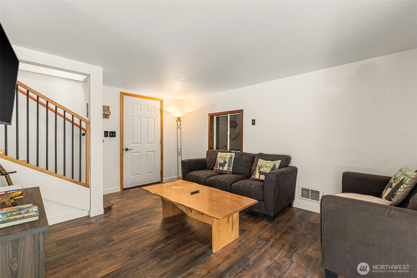 695 Sand Creek Road Cashmere, WA 98815 - Photo 12 of 40 a living room with furniture and a wooden floor