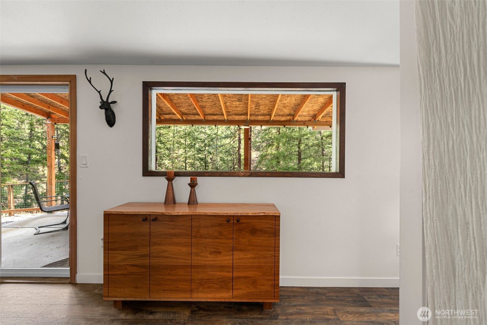 695 Sand Creek Road Cashmere, WA 98815 - Photo 15 of 40 a room with a window and a dresser