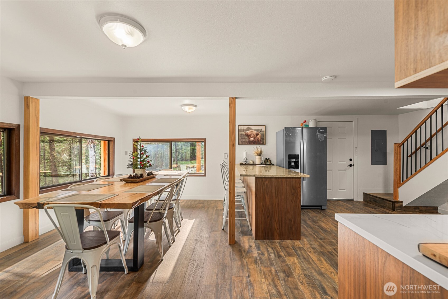 695 Sand Creek Road Cashmere, WA 98815 - Photo 17 of 40 a kitchen with a table and chairs in it
