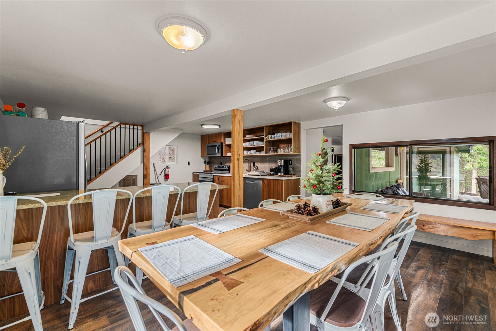 695 Sand Creek Road Cashmere, WA 98815 - Photo 19 of 40 a view of a dining room with furniture window and outside view