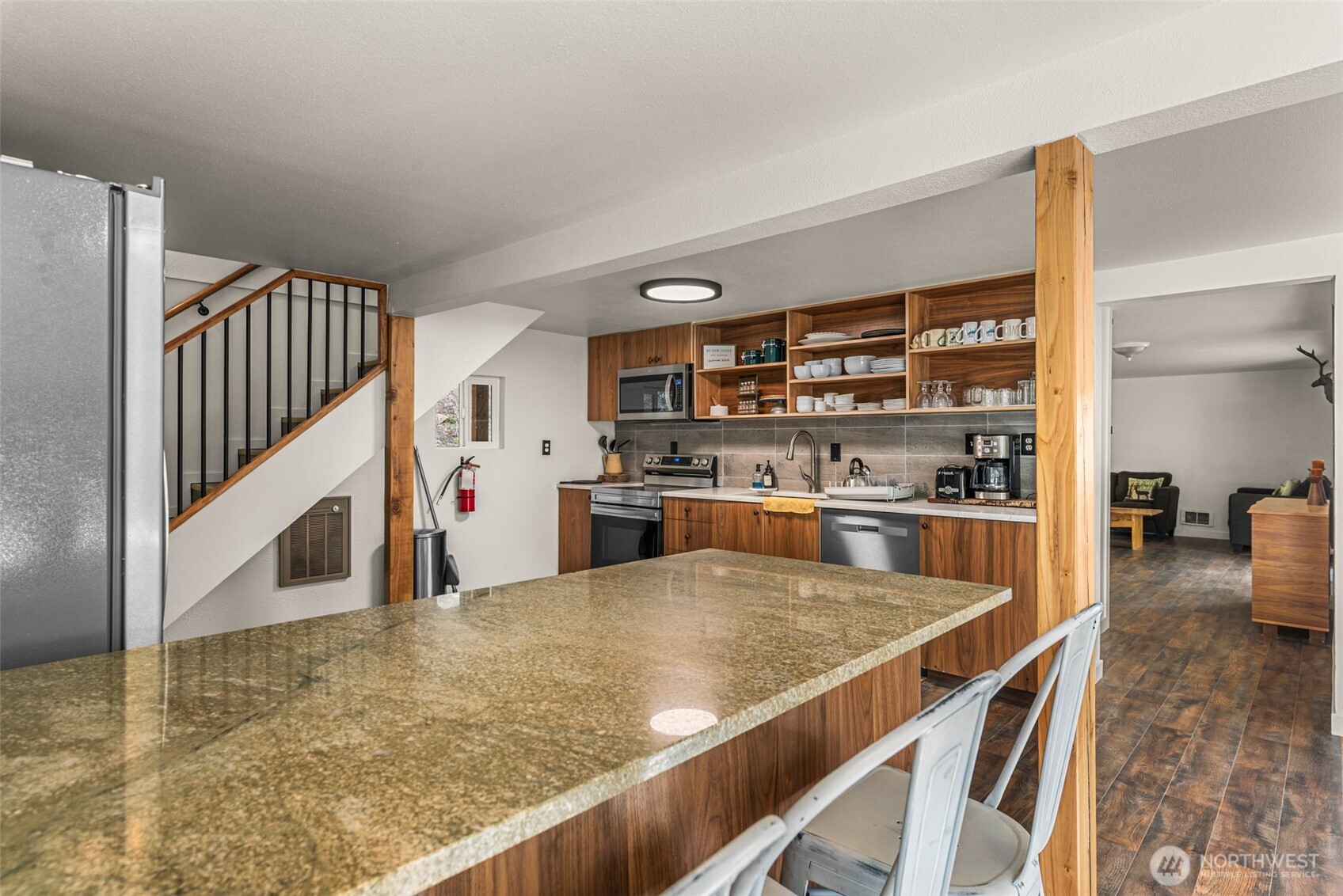 695 Sand Creek Road Cashmere, WA 98815 - Photo 20 of 40 a kitchen with stainless steel appliances granite countertop a sink and counter space