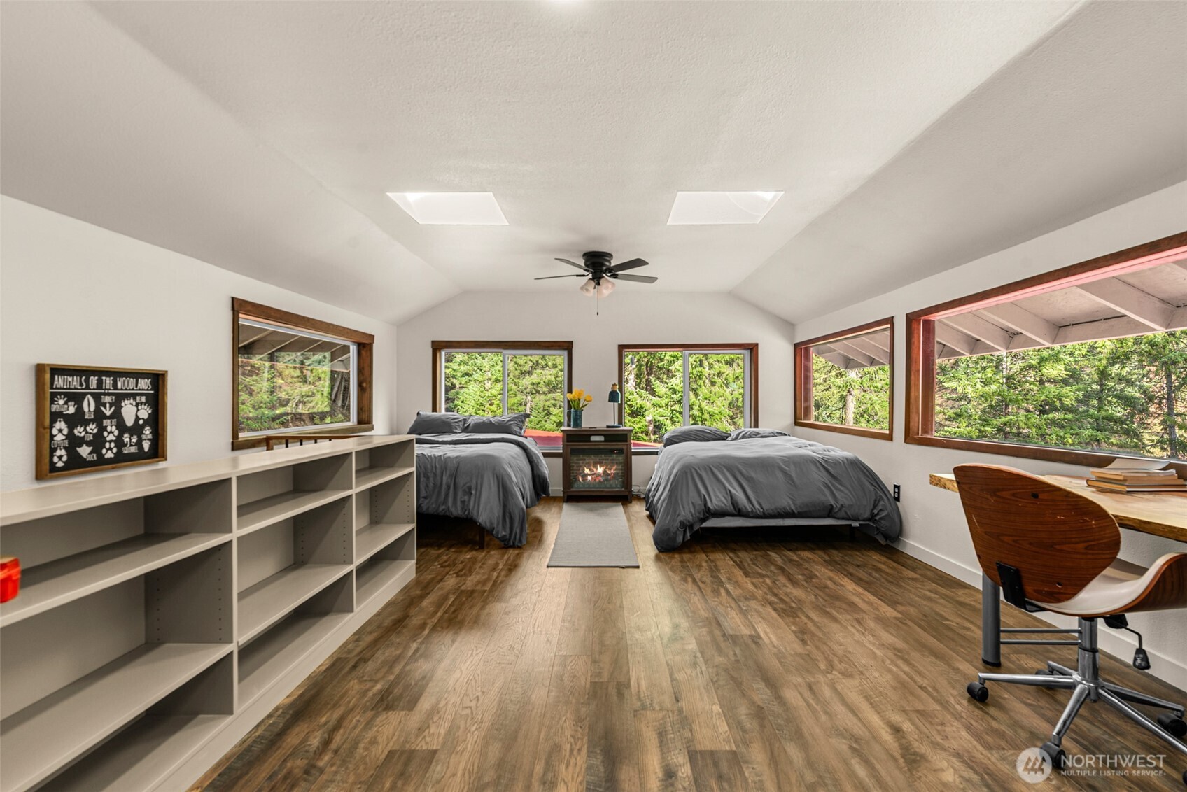 695 Sand Creek Road Cashmere, WA 98815 - Photo 29 of 40 a view of a bedroom with furniture and a window