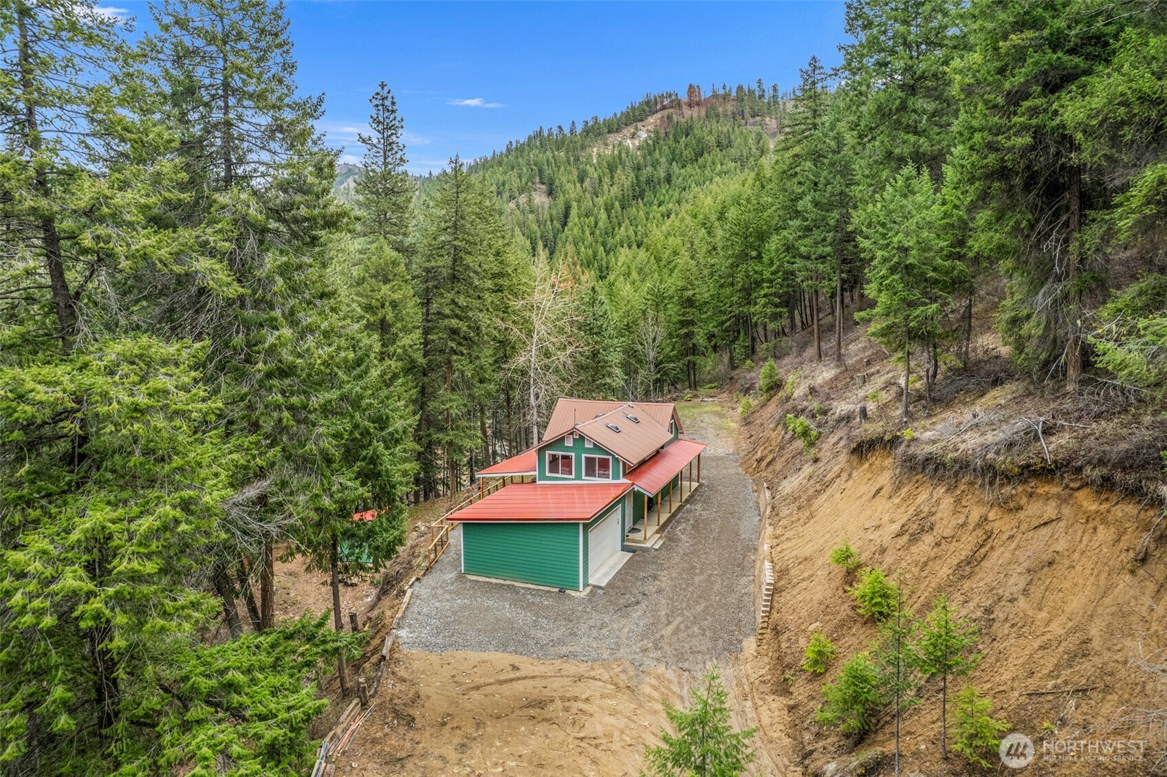 695 Sand Creek Road Cashmere, WA 98815 - Photo 34 of 40 a view of a outdoor with trees and a yard