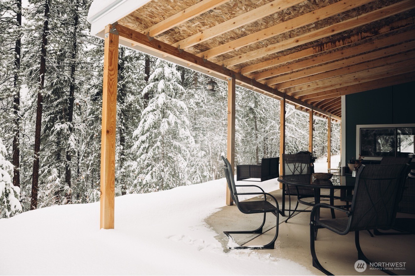 695 Sand Creek Road Cashmere, WA 98815 - Photo 38 of 40 a outdoor space with patio the couches and chairs with wooden floor