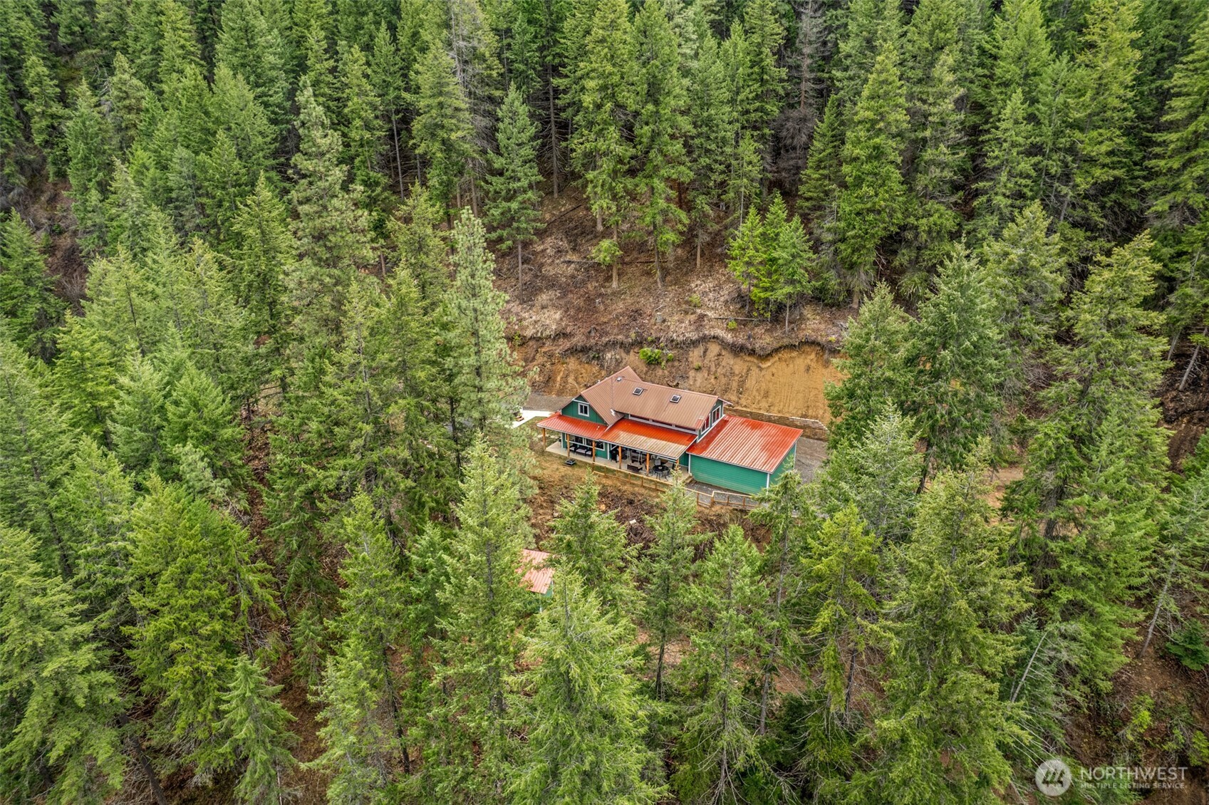 695 Sand Creek Road Cashmere, WA 98815 - Photo 4 of 40 an aerial view of a house with a yard