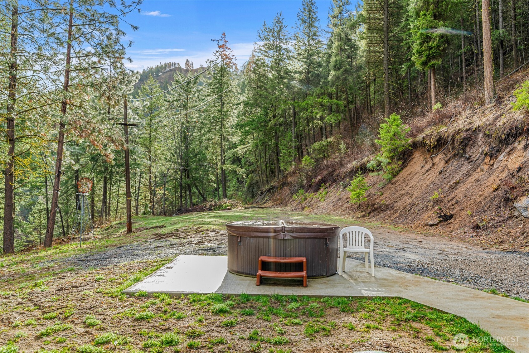 695 Sand Creek Road Cashmere, WA 98815 - Photo 6 of 40 a view of a backyard with wooden fence