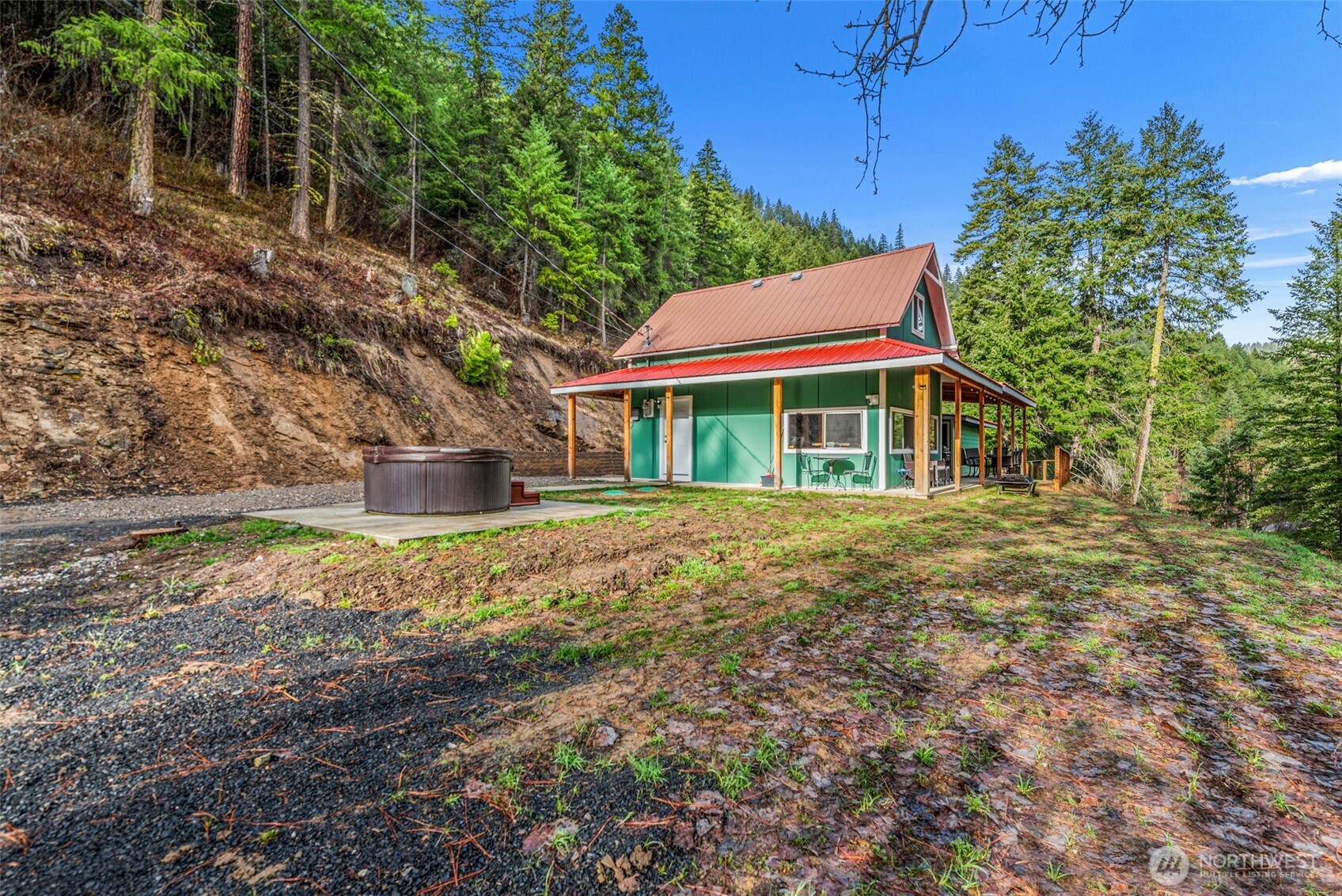 695 Sand Creek Road Cashmere, WA 98815 - Photo 8 of 40 a front view of a house with a yard