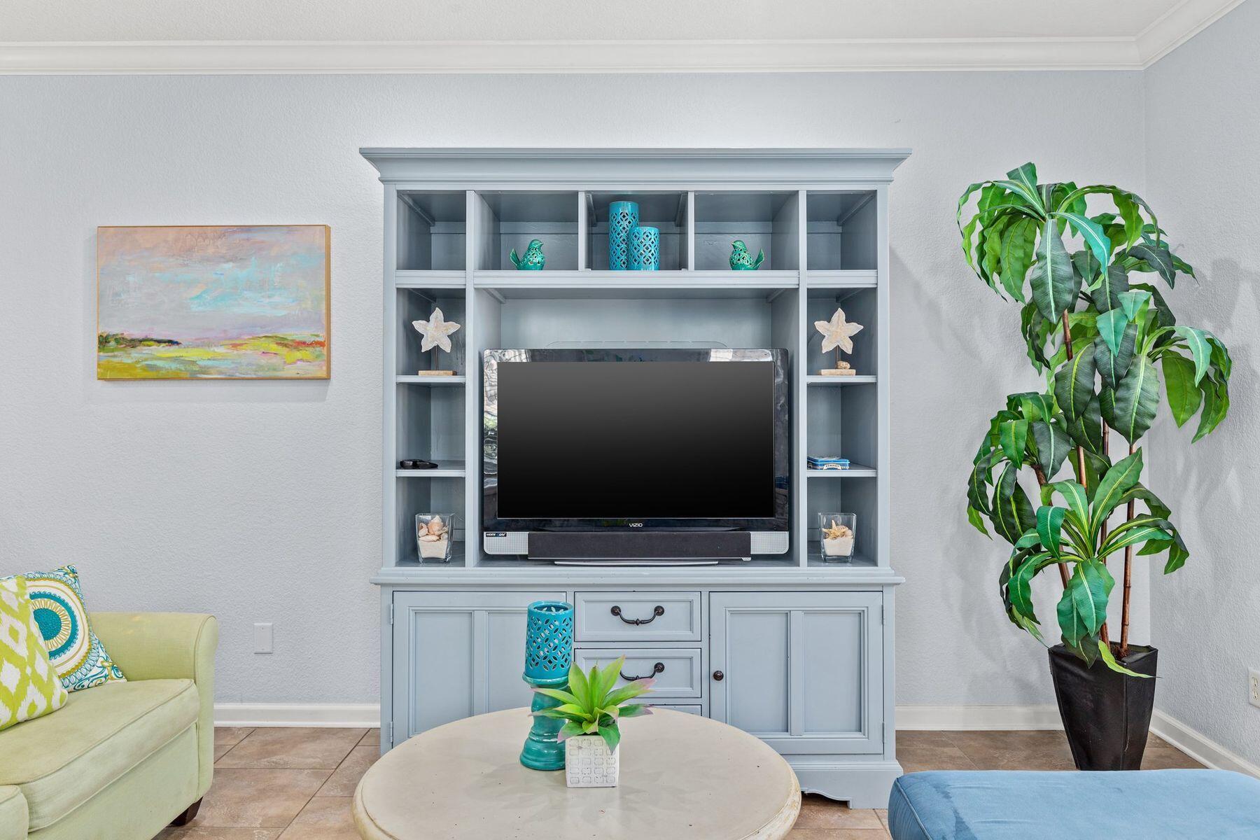 156 Southfields Road Panama City Beach, FL 32413 - Photo 12 of 35 a living room with furniture and a potted plant
