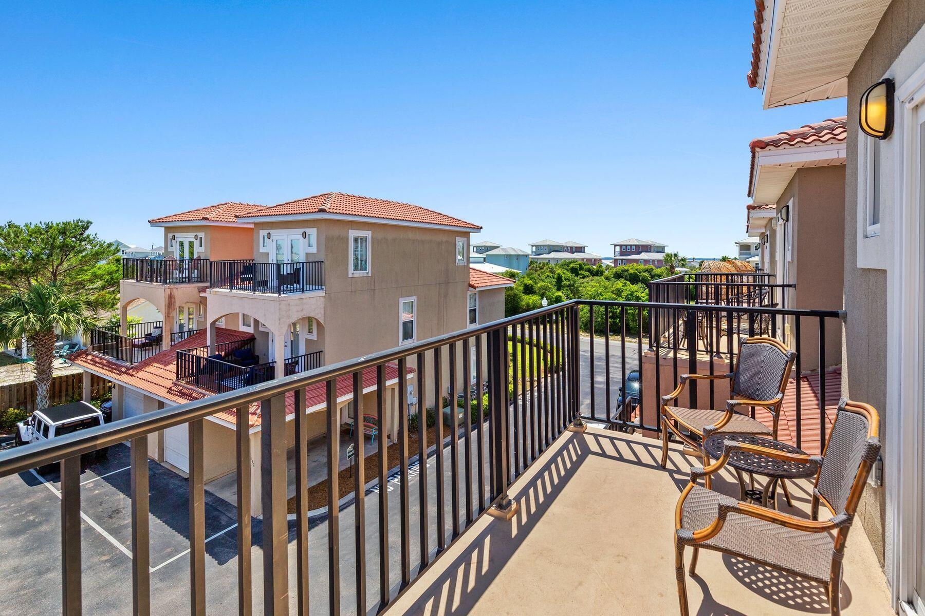 156 Southfields Road Panama City Beach, FL 32413 - Photo 20 of 35 a view of a balcony with furniture
