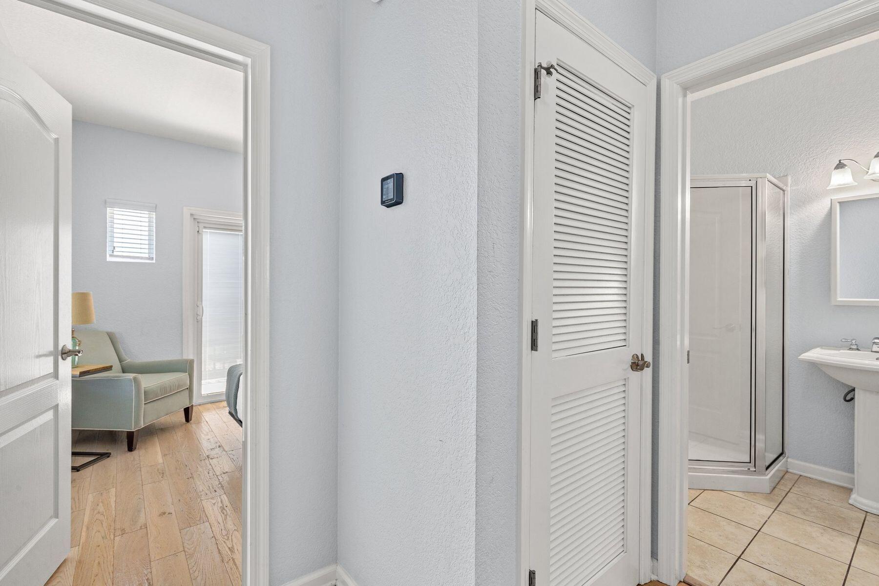 156 Southfields Road Panama City Beach, FL 32413 - Photo 22 of 35 a view of a bathroom from the hallway