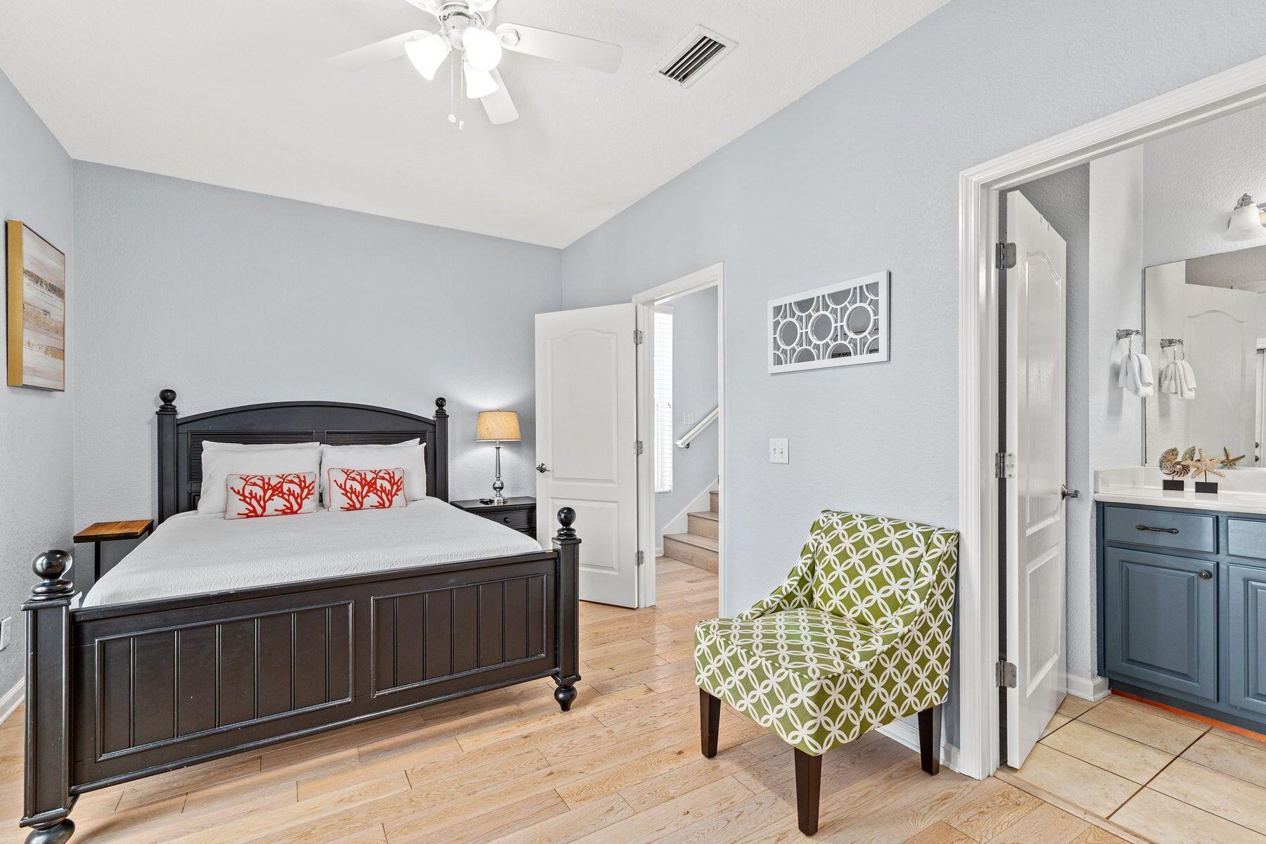 156 Southfields Road Panama City Beach, FL 32413 - Photo 26 of 35 a bedroom with a bed dresser and window