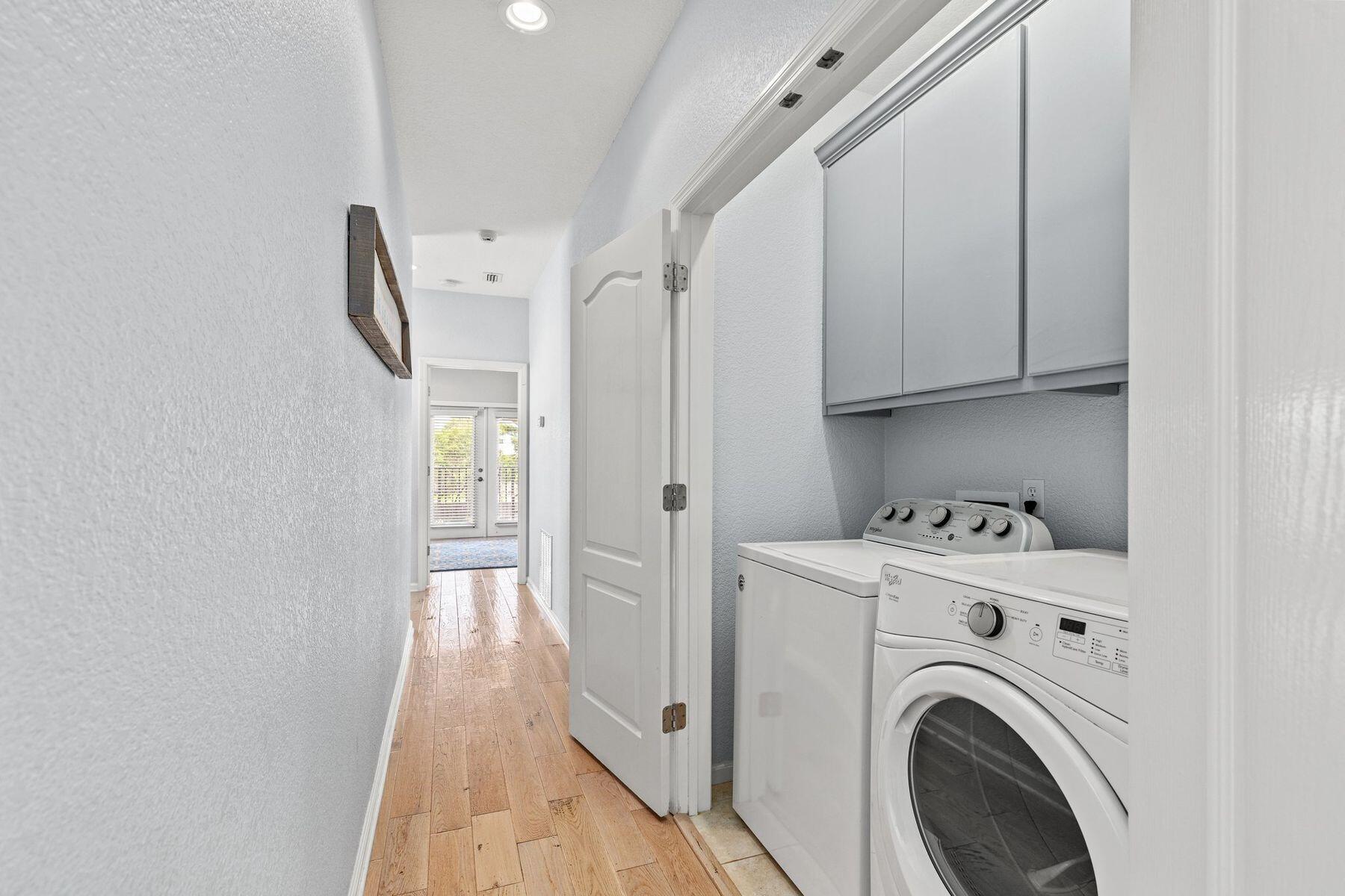 156 Southfields Road Panama City Beach, FL 32413 - Photo 30 of 35 a view of a hallway with washer and dryer