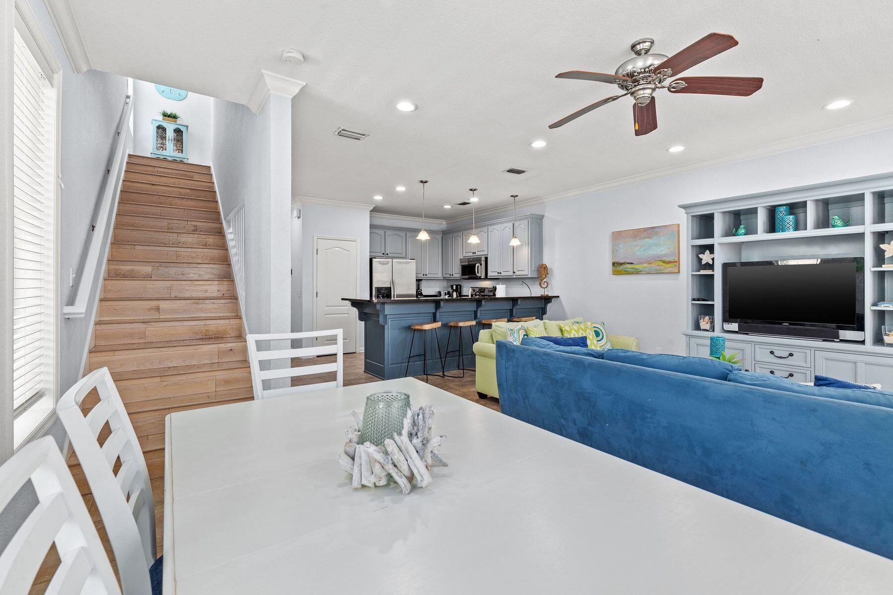 156 Southfields Road Panama City Beach, FL 32413 - Photo 10 of 35 a living room with furniture and a flat screen tv