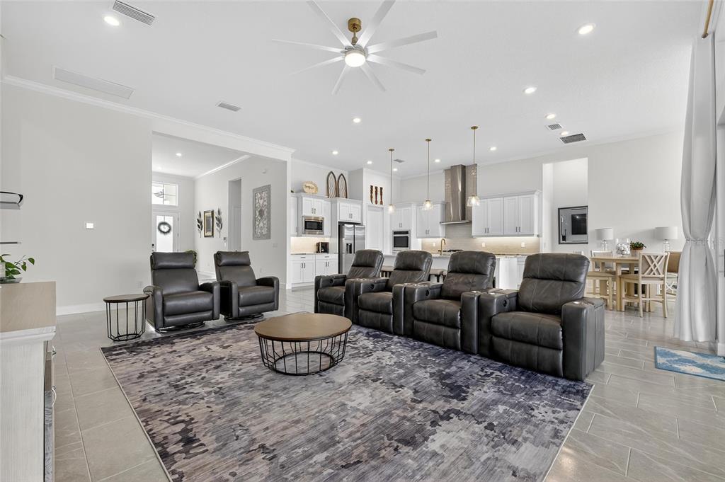 5975 Blakeney Loop Apollo Beach, FL 33572 - Photo 12 of 100 a living room with furniture and a view of living room