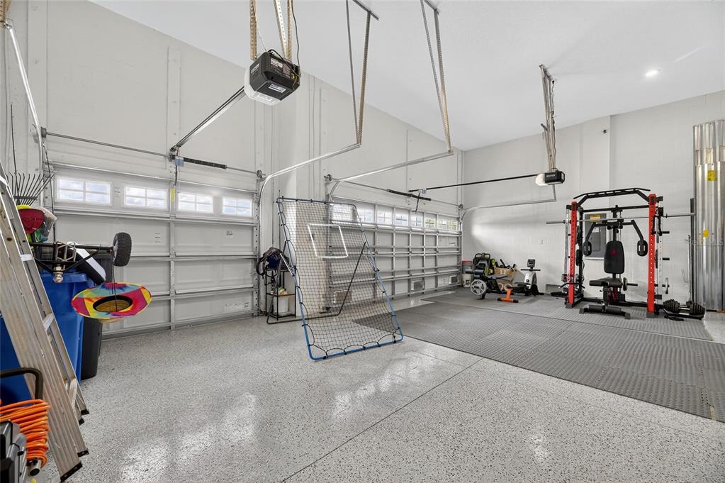 5975 Blakeney Loop Apollo Beach, FL 33572 - Photo 45 of 100 a view of parking garage with cars