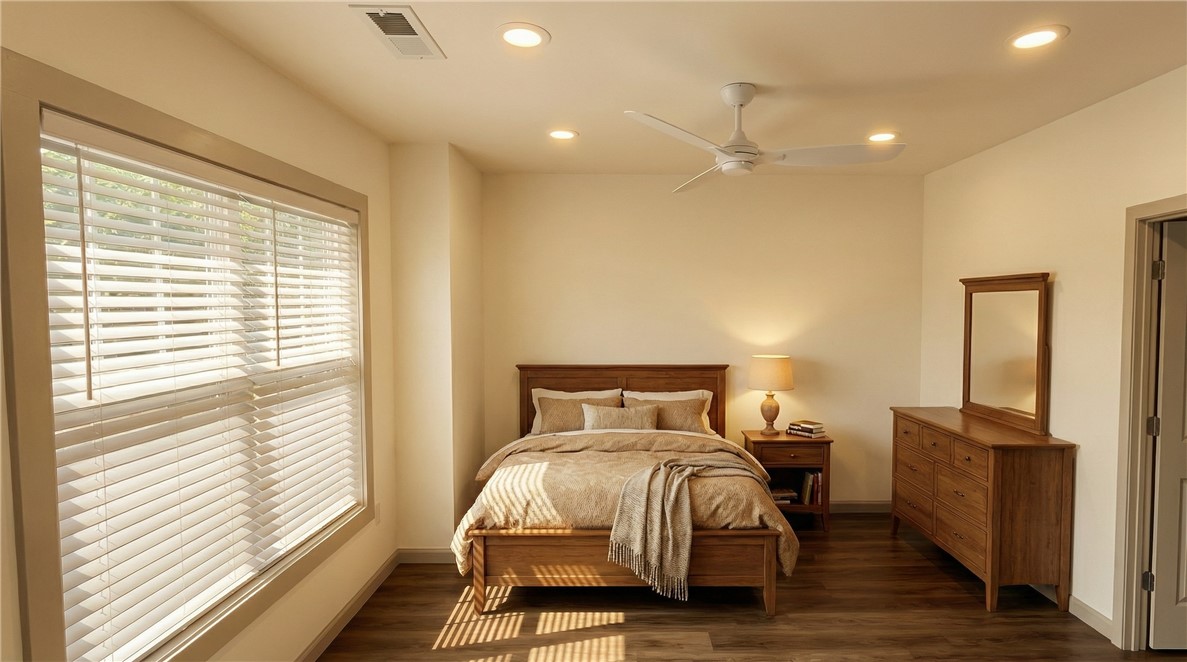 102 Kelly Road Clemson, SC 29631 - Photo 7 of 18 Traditional Timeless Package. This spacious room features ample natural light and rich wood flooring, ideal for relaxation.