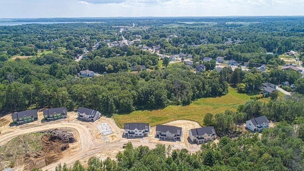 16 Meadowview Lane, Unit B Salisbury, MA 01952 - Photo 20 of 23 a view of a house with a yard