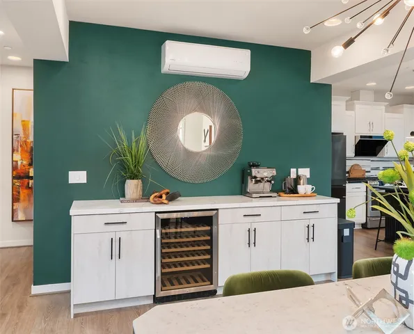 a kitchen with a sink and a stove top oven
