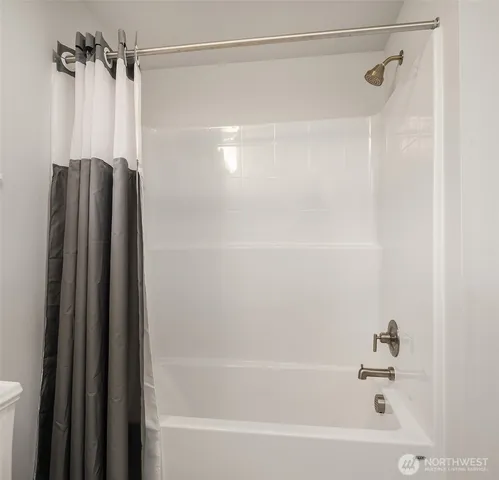 a front view of a building with glass windows