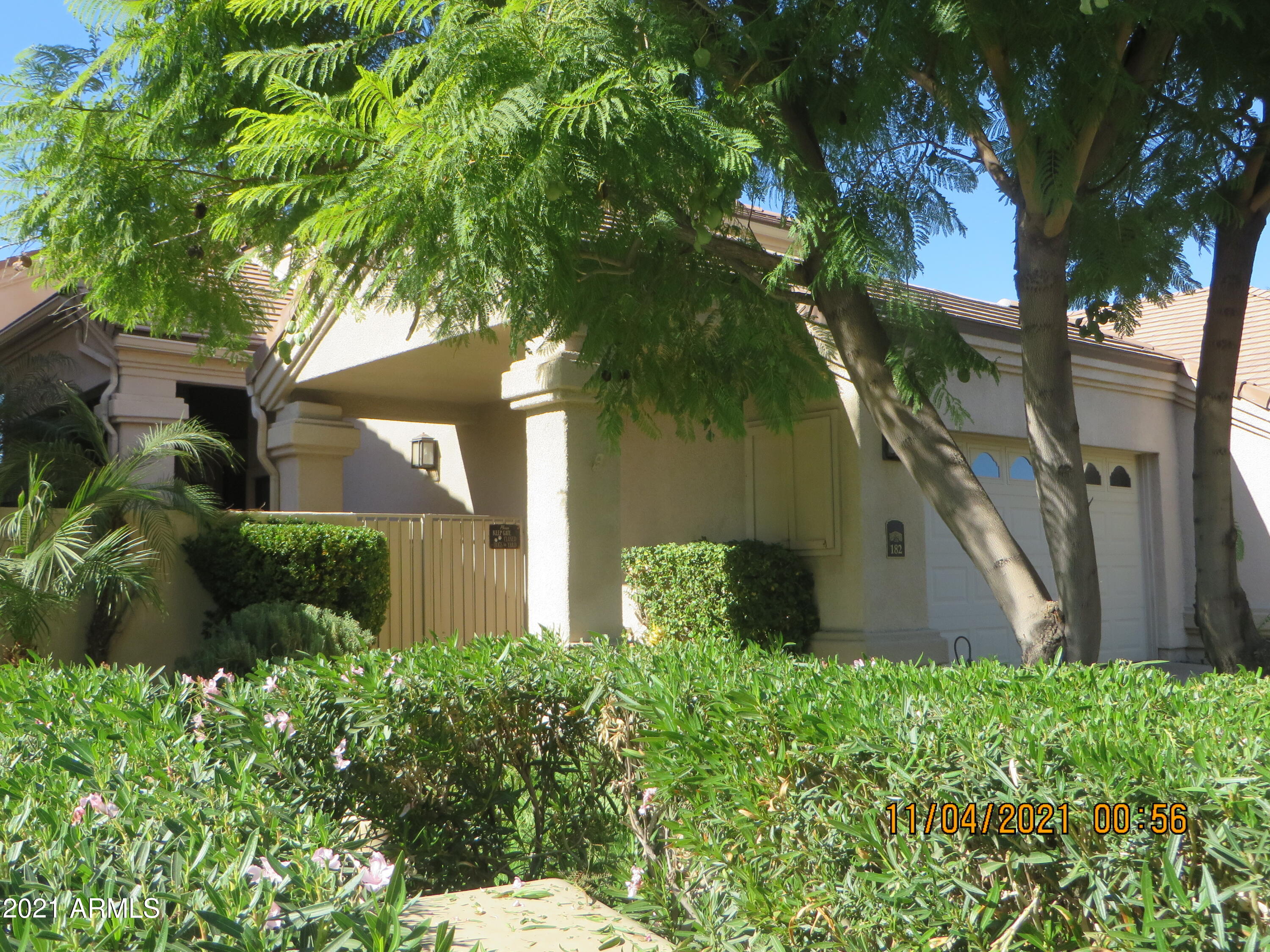 Lushly landscaped front entrance