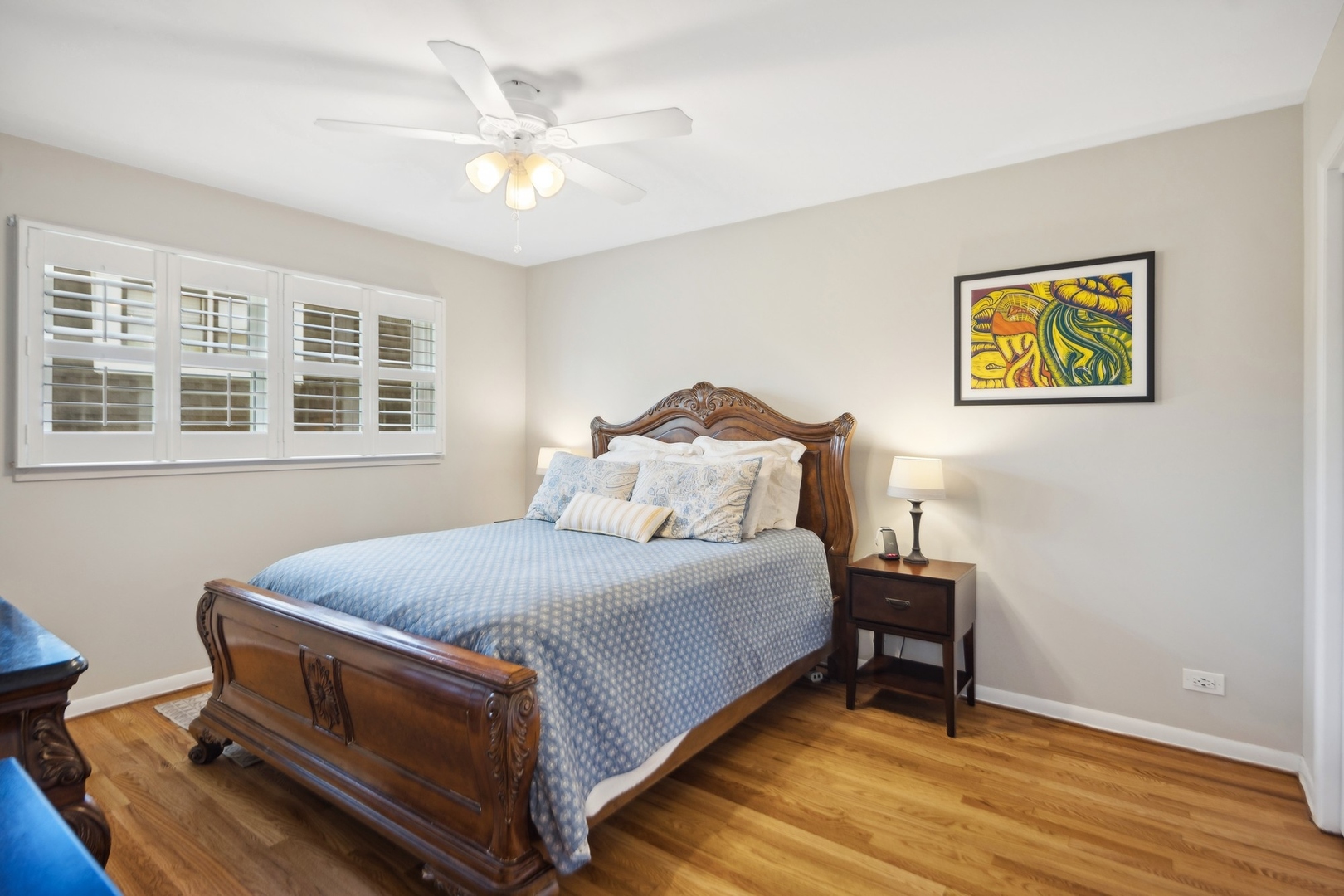 7717 Sawyer Road Darien, IL 60561 - Photo 7 of 15 a bed room with a bed and a chair