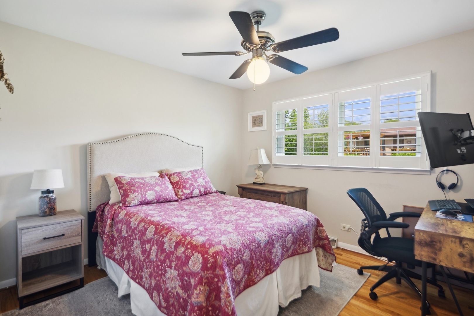 7717 Sawyer Road Darien, IL 60561 - Photo 9 of 15 a bedroom with bed and window