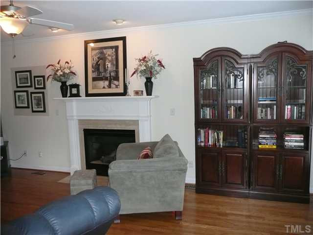 Family room has new hardwood floors, custom mantle, gas logs, plantation blinds and great dimensions to accommodate all your furniture. Fabulous room for family living and entertaining! Den/Family/Great Room