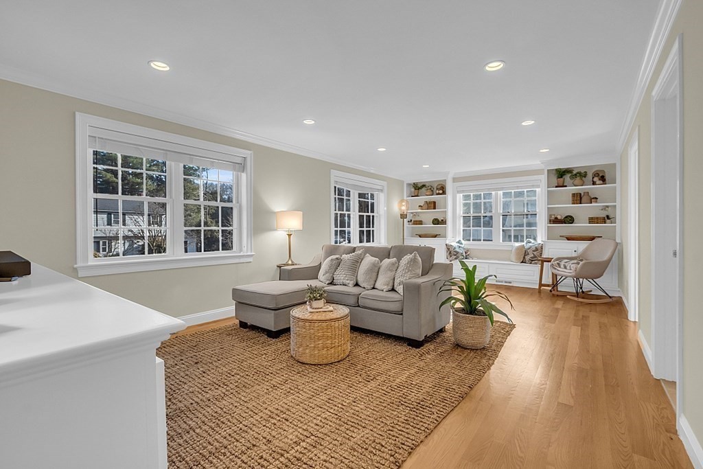 35 Pinewood Road Wellesley, MA 02482 - Photo 13 of 39 a living room with furniture and a wooden floor