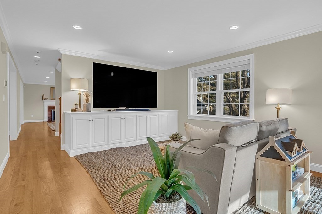 35 Pinewood Road Wellesley, MA 02482 - Photo 15 of 39 a living room with furniture and a flat screen tv